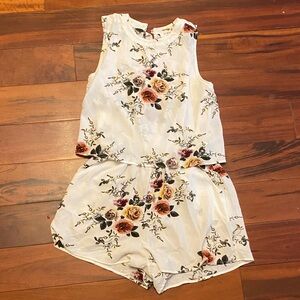 Umgee Floral Patterned Romper with Red and Yellow Accents.